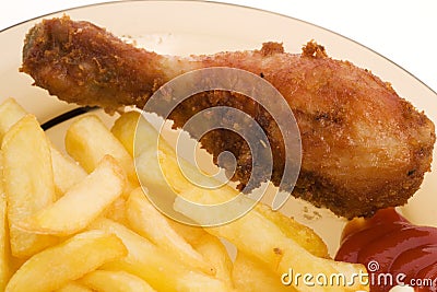 Fries and drumsticks Stock Photo