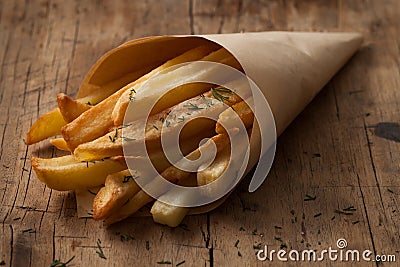 Fries french herb still life wood background close up Stock Photo