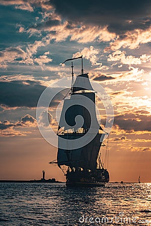 The Frigate Shtandar in calm weather sailing sunset time Riga Latvia Editorial Stock Photo