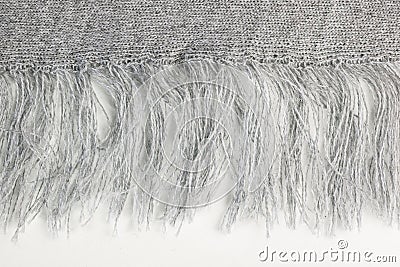Fringe of grey knitwear fabric Stock Photo