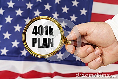 In front of the American flag, a man holds a magnifying glass in his hand with the inscription - 401K PLAN Stock Photo