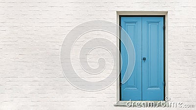 Front blue wooden door with white block wall background, elements of architecture Stock Photo