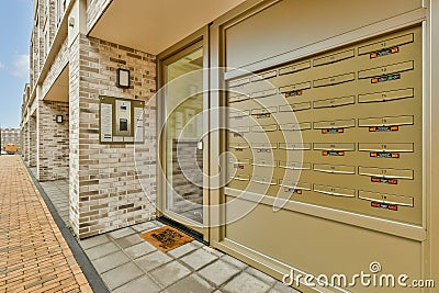 the front door of a house with a lockers Editorial Stock Photo