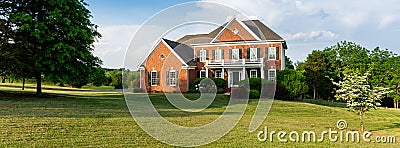 Front elevation large single family home Stock Photo