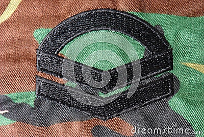 Corporal Rank Insignia Stock Photo