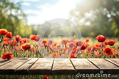 In front of a field of red poppies, a wooden rustic table serves as a perfect setting for product display and picnic Stock Photo