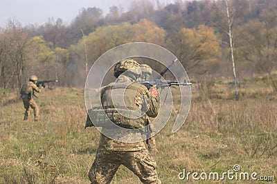 Front Line. Military attack on battlefield from ambush Stock Photo