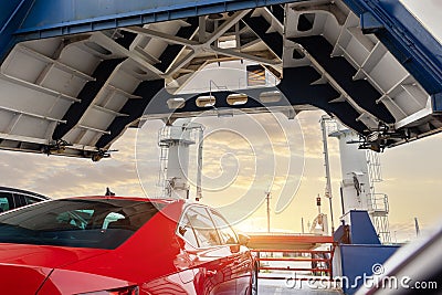 Front open door of passenger freight cargo ferry boat vessel ship with loaded cars and vehicles. Sea transportation Stock Photo