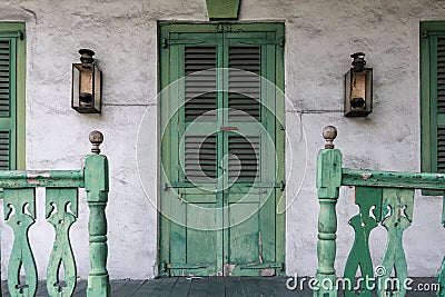 Front Porch with Green Door and Railing Stock Photo