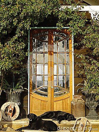 Front porch of a rustic country house, idyllic scene Stock Photo