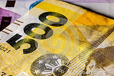 Front side of 500 peso bill of the Philippines. 500 Philippine Peso. Currency of the Island state. Extreme close up of five Stock Photo