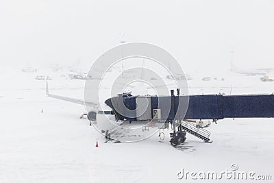 Front view of airplane at gate Stock Photo