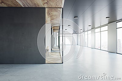 Front view on blank dark wall with place for your advertising poster or campaign in sunlit spacious office hall with wooden floor Stock Photo