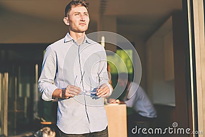 Front view of business man gathering his thoughts before important negotiations Stock Photo