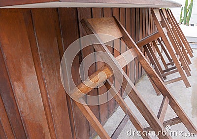 Front view with copy space of wooden chairs and bar in vintage restaurant which is closed due to disease pandemic and bad economy Stock Photo