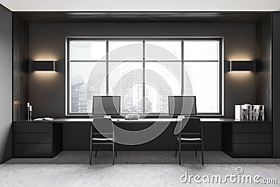 Front view on dark office room interior with computers, desk Stock Photo