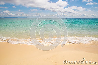 Front view Emerald Sea waves and sand beach Stock Photo