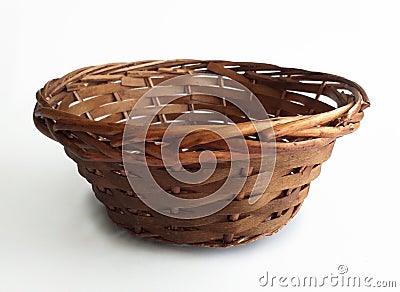 Front view of empty handmade wicker oval basket isolated on white background Stock Photo