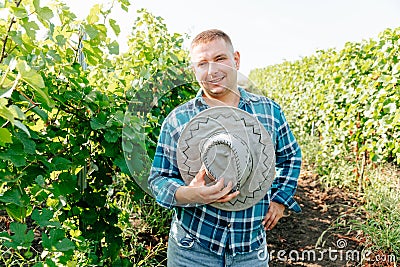 front view of the farmer looking at the camera and smiling Stock Photo