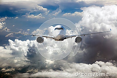 Front view of flying passenger plane Stock Photo