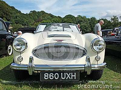 Front view of the headlights and bumper of a white Austin Healey 3000 Sports car at the Annual Hebden Bridge Vintage Weekend Vehic Editorial Stock Photo