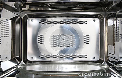 Front view inside of empty clean microwave oven interior Stock Photo