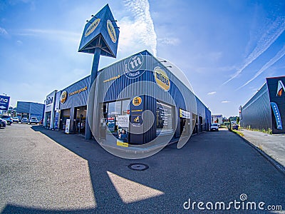 Front view of the Midas workshop specializing in car repair in Le Mans, France Editorial Stock Photo