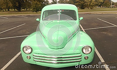 Front view of mint green antique vehicle Stock Photo