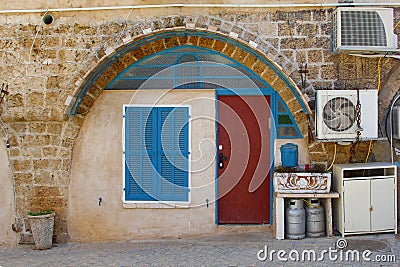 Front view stone house door shutters, Old Jaffa, Tel Aviv Stock Photo