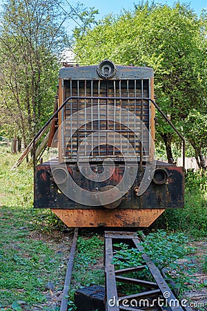 Front view of an old rusty broken diesel locomotive Stock Photo