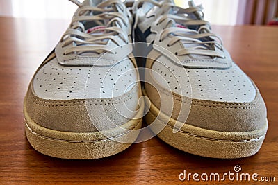 Front View Of A Pair Of Vintage White Sneaker Shoes Stock Photo