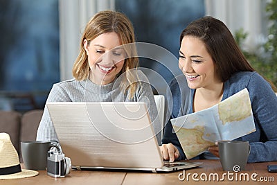 Tourists planning travel in an apartment Stock Photo