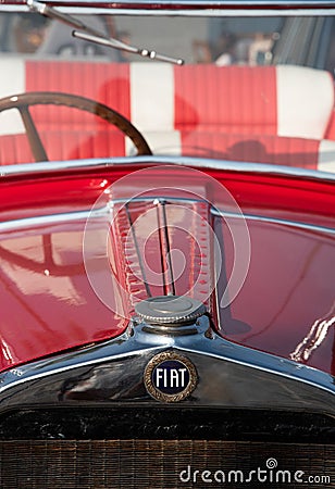 Front view red collectible Fiat classic antique vintage car. Fiat logo and front details Editorial Stock Photo