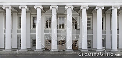 Front view of a row of white columns Stock Photo