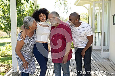 Happy family smiling to each other at home Stock Photo