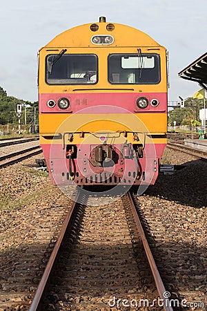 Front view of trains on railways track parking in railroads plat Stock Photo