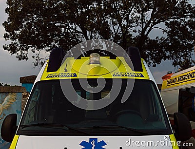 Front view white and yellow ambulance Editorial Stock Photo