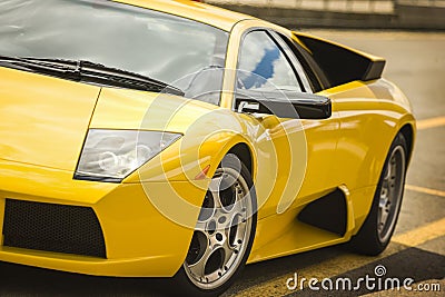 Front view of a yellow luxury sportcar Editorial Stock Photo