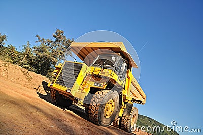 Front view of yellow tipper truck Stock Photo