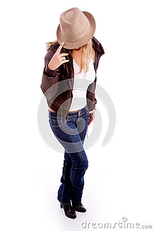 Front view of young female wearing hat Stock Photo