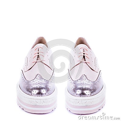 Front view of ywo pastel leather women's oxford shoes with a chunky platform Stock Photo