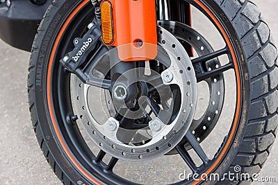 front wheel of Harley-Davidson Pan America 1250 Motorcycle with brembo disc brakes, closeup Editorial Stock Photo