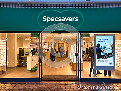 The frontage of a branch of optical retail chain Specsavers. The company sells glasses, sunglasses, contact lenses Editorial Stock Photo