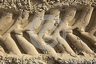 Tire Tracks in the Sand - Frontal Close Up Stock Photo