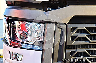 Frontal lighting products for on-highway vehicles, which includes integrated daytime running lights and beam patterns. Bi-Xenon Stock Photo