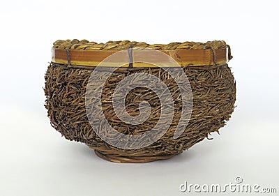 Frontal view of Natural rattan bird nest bowl isolated on white background.Round and empty handmade natural bamboo container of Stock Photo