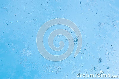 Frosting macro. Cold snow winter background. Blue crystal frozen abstract pattern. White frost ice texture. Stock Photo