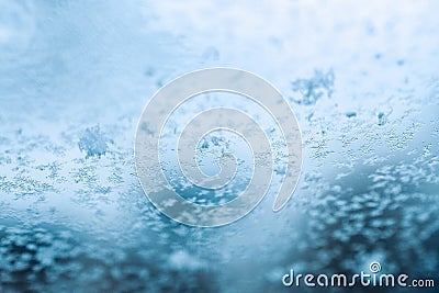 Frosting macro. Cold snow winter background. Blue crystal frozen abstract pattern. White frost ice texture. Stock Photo