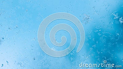 Frosting macro. Cold snow winter background. Blue crystal frozen abstract pattern. White frost ice texture. Stock Photo