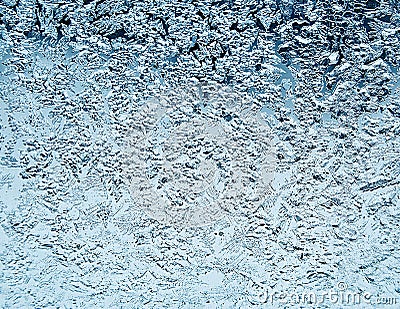 Frosty natural pattern on winter window.Frost patterns on glass. Stock Photo